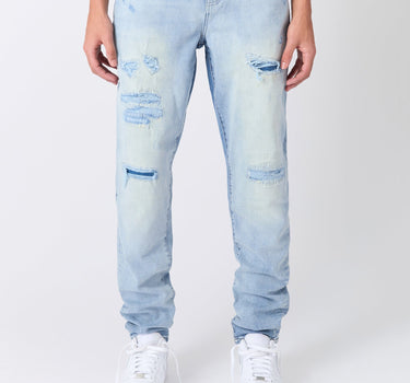 Ripped And Repaired Washed Denim Jeans - Light Blue