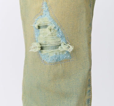 Ripped And Repaired Denim Pants - Vintage Blue