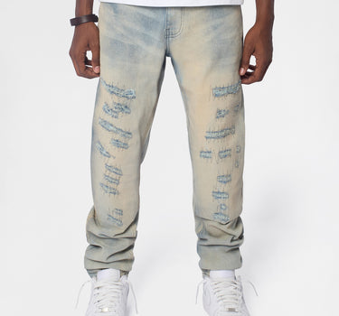 Light Wash Repaired Denim Jeans - Blue