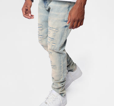 Light Wash Repaired Denim Jeans - Blue