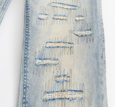 Light Wash Repaired Denim Jeans - Blue